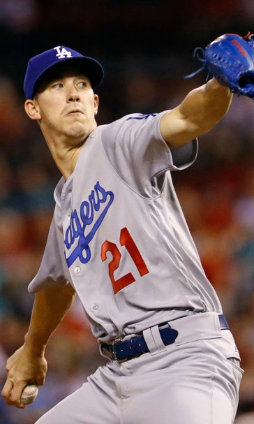 Buehler, Dodgers blank Cards to draw even in wild-card race